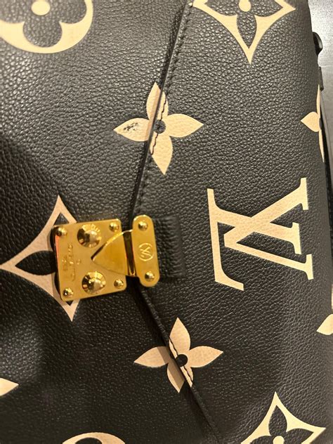 Scratches on my LV Pochette Metis Lock! 